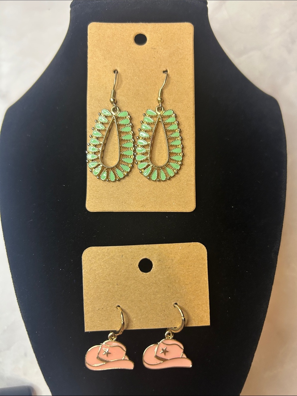 Gold-Tone Teardrop Earrings accompanied with pink cowboy hat earrings
